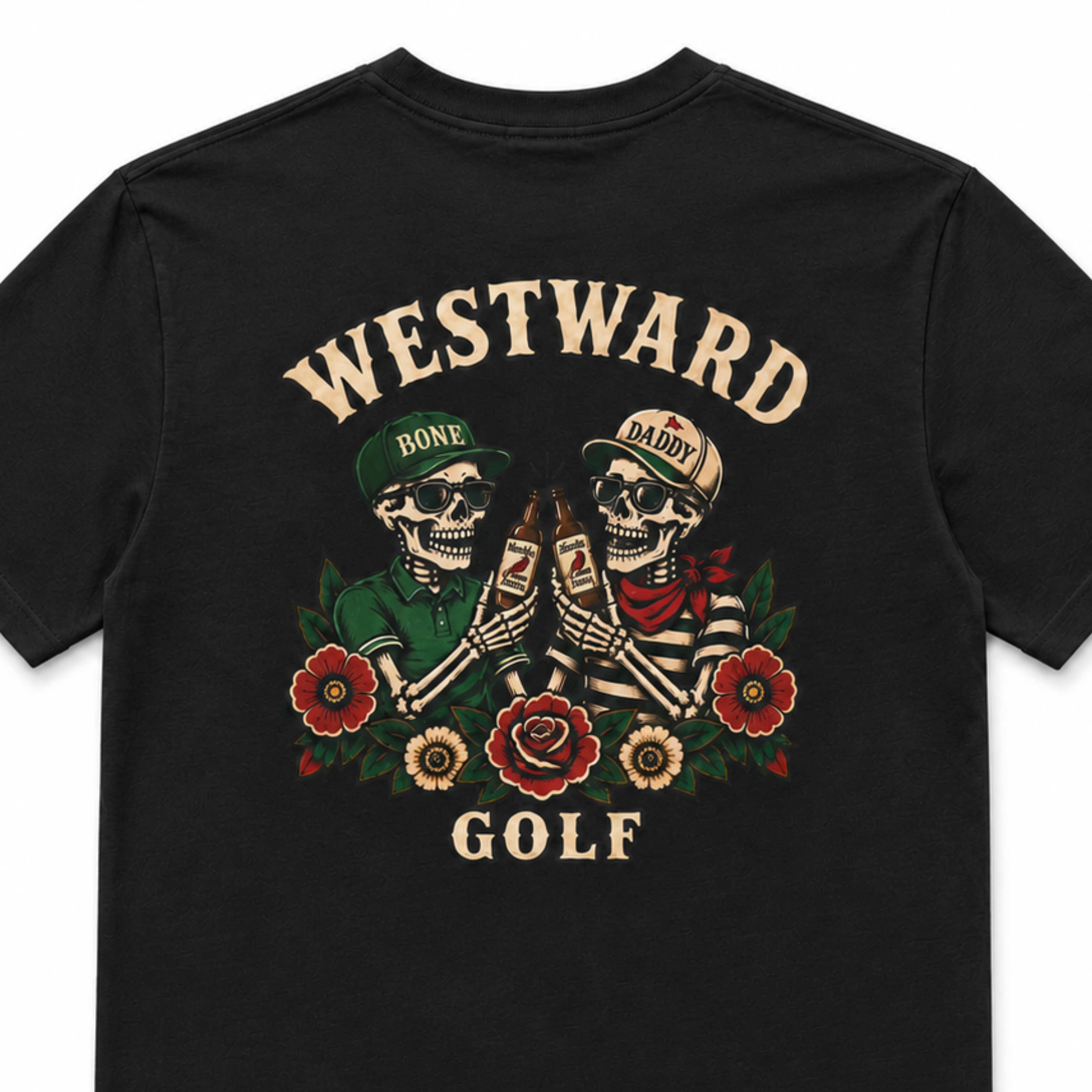 Close-up black Westward Golf graphic t-shirt with vintage skeleton golfers clinking beer bottles, floral tattoo artwork, and bold cream WESTWARD GOLF back print