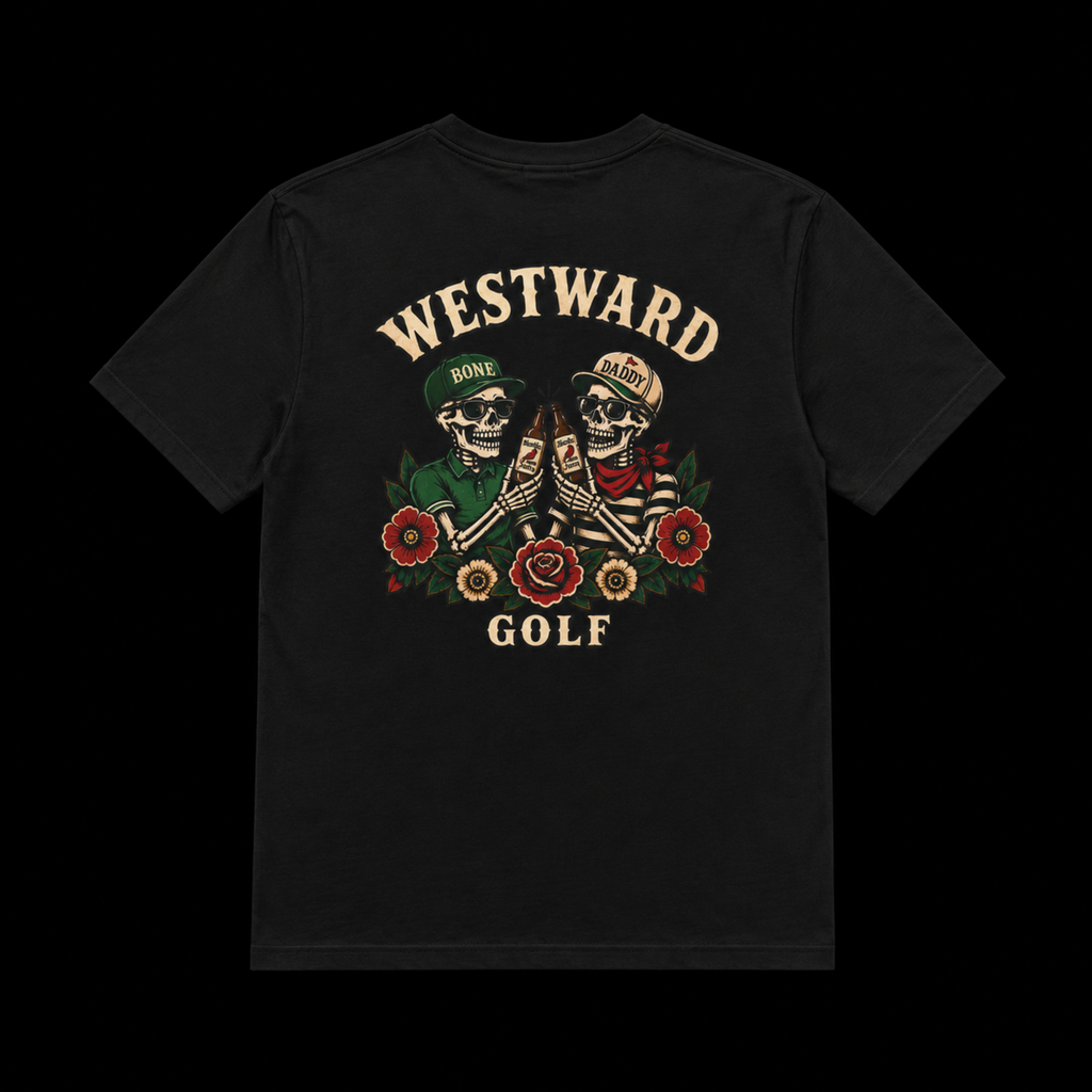 Black Westward Golf graphic t-shirt with vintage skeleton golfers clinking beer bottles, floral tattoo artwork, and bold cream WESTWARD GOLF back print