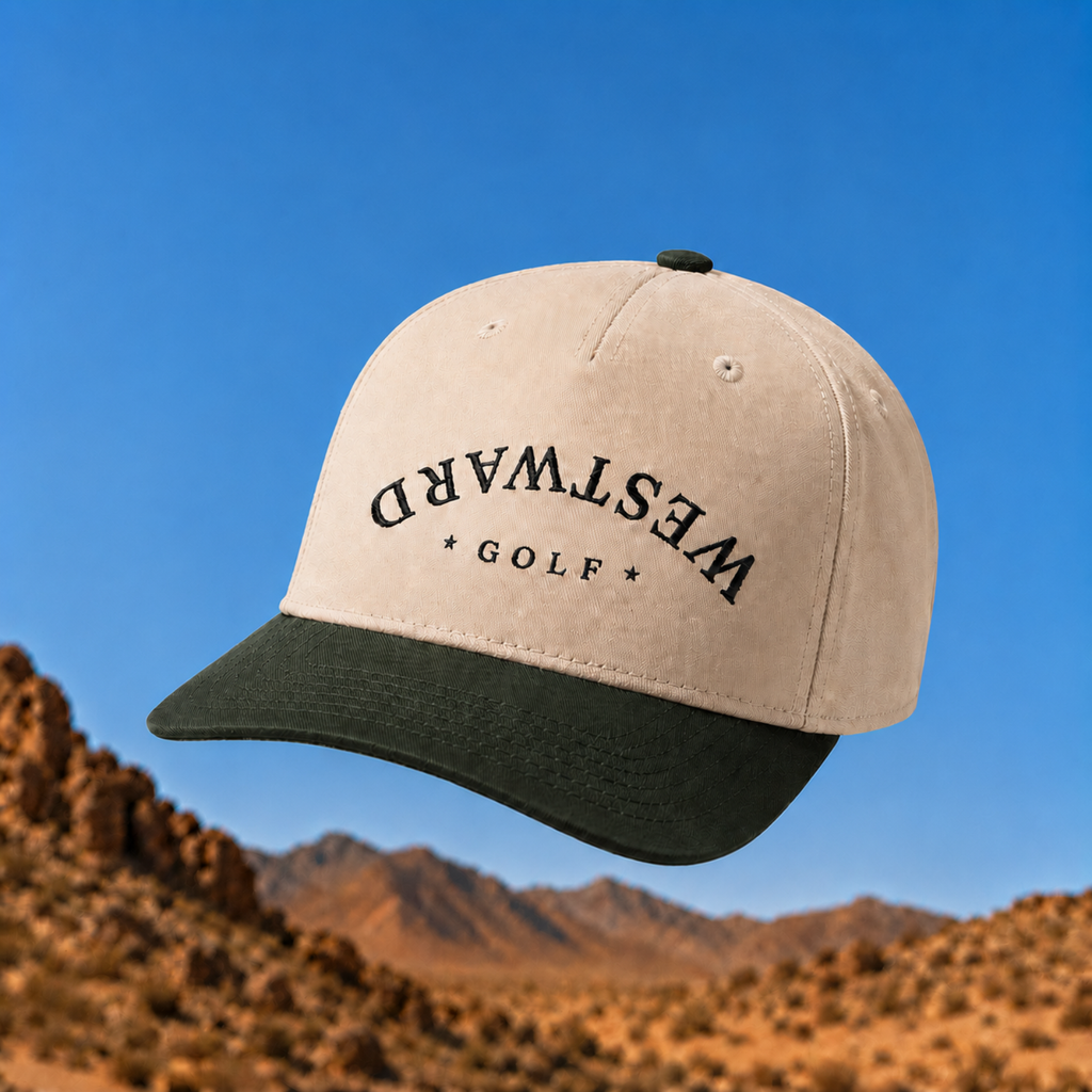 Beige and black cap with 'Westward Golf' text against a desert landscape